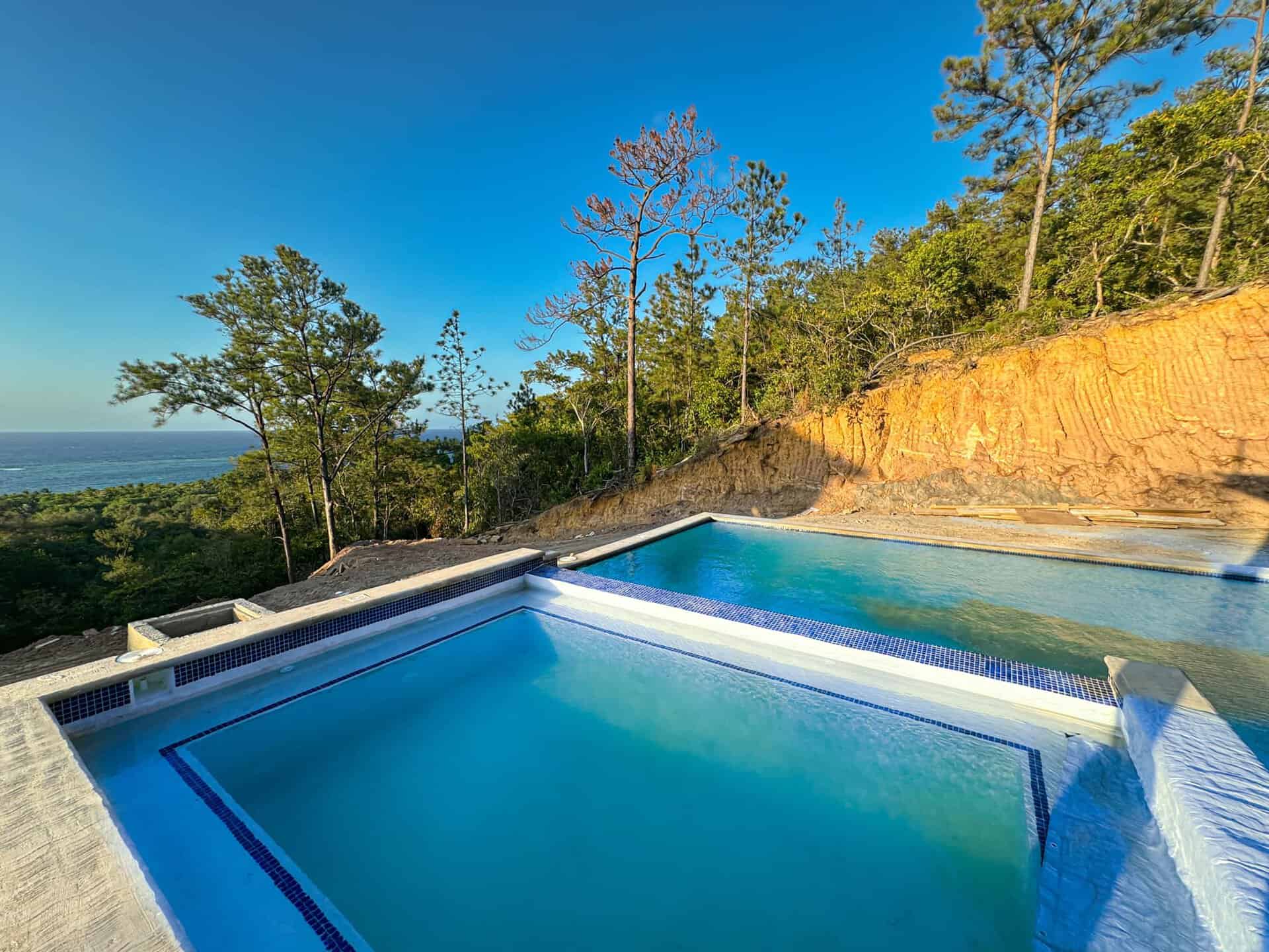 Roatan home builder pools